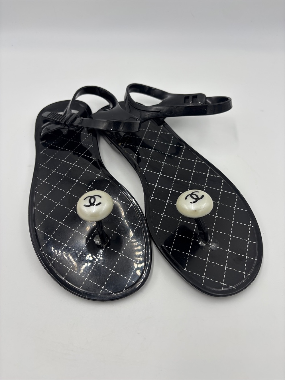 CHANEL Black Quilted Jelly Thong Sandals with White Logo Buttons